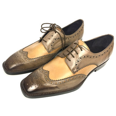 ชายชุดพระสงฆ์คู่รองเท้า brogue รายละเอียดในหนังสีเทียม